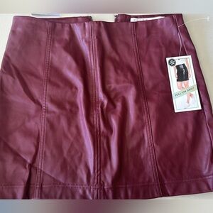 NWT “pleather” mini skirt Size L